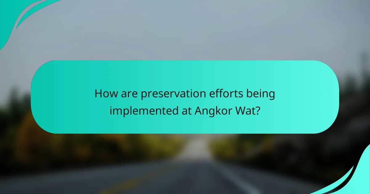 How are preservation efforts being implemented at Angkor Wat?
