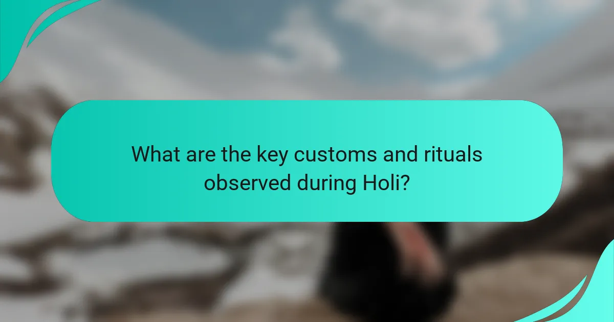 What are the key customs and rituals observed during Holi?