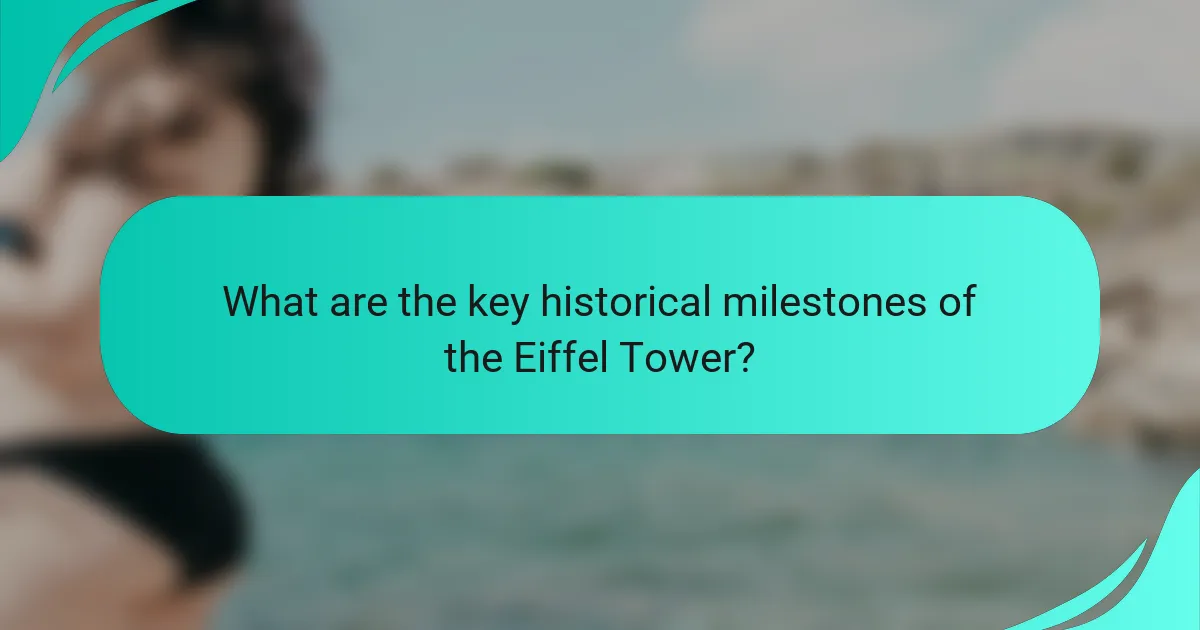 What are the key historical milestones of the Eiffel Tower?